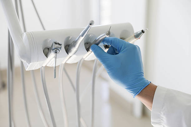 Professional Tooth Extraction technician working in Cleveland County County, OK